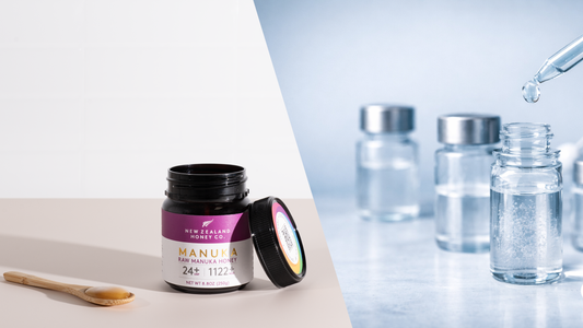 A jar of cream with a wooden spatula and glass vials.