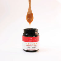 New Zealand Honey Co. bamboo Daily Spoon engraved with the brand name — accessory detail