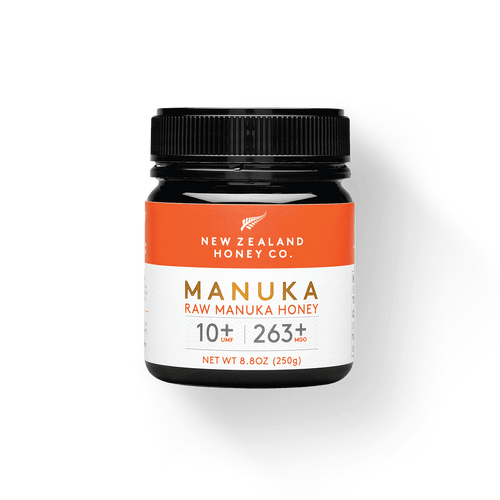 Jar of New Zealand Honey Co. Manuka Honey UMF™ 10+ MGO 263+ with orange label, 250g (8.8oz)