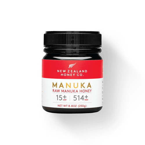 Jar of New Zealand Honey Co. Manuka Honey UMF™ 15+ MGO 514+ with red label, 250g (8.8oz)
