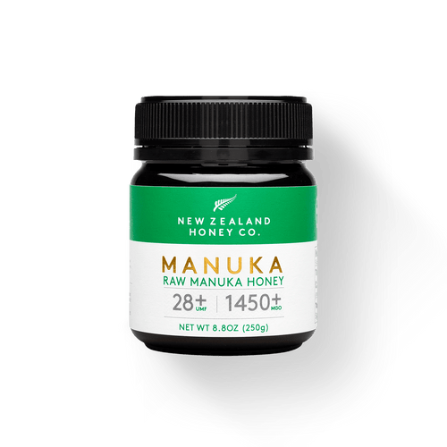 Jar of New Zealand Honey Co. Manuka Honey UMF™ 28+ MGO 1450+ with green label, 250g (8.8oz)